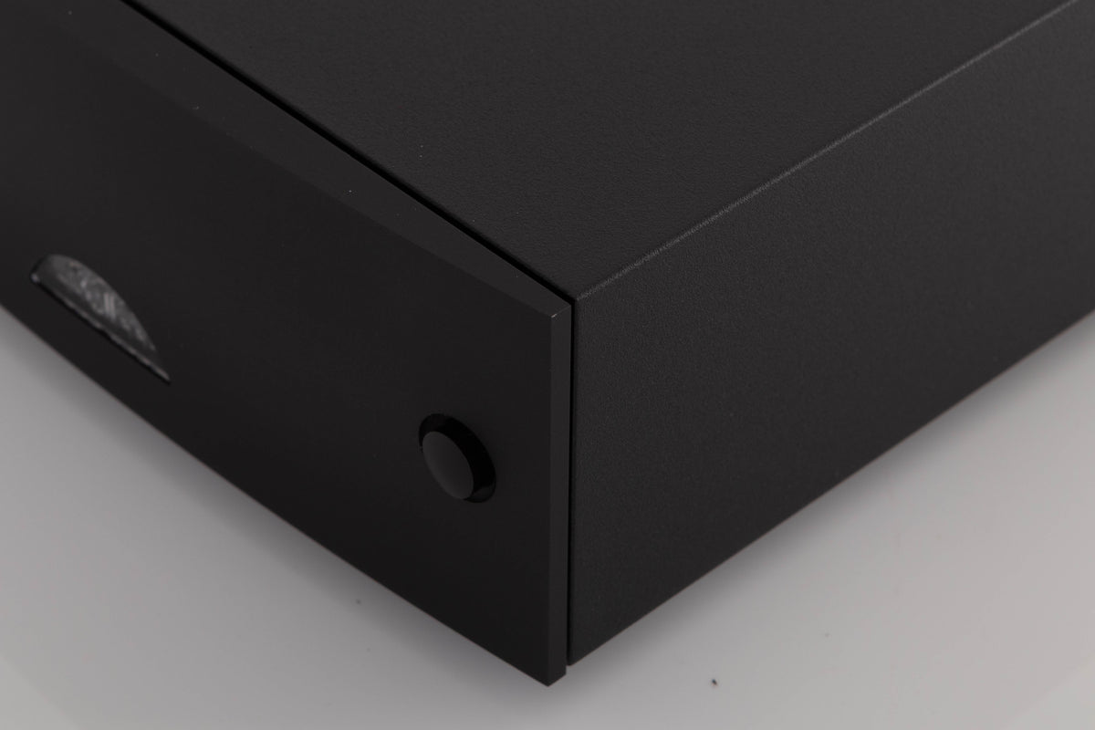 Front right corner of a used Naim Hicap DR Power Supply in a Black finish
