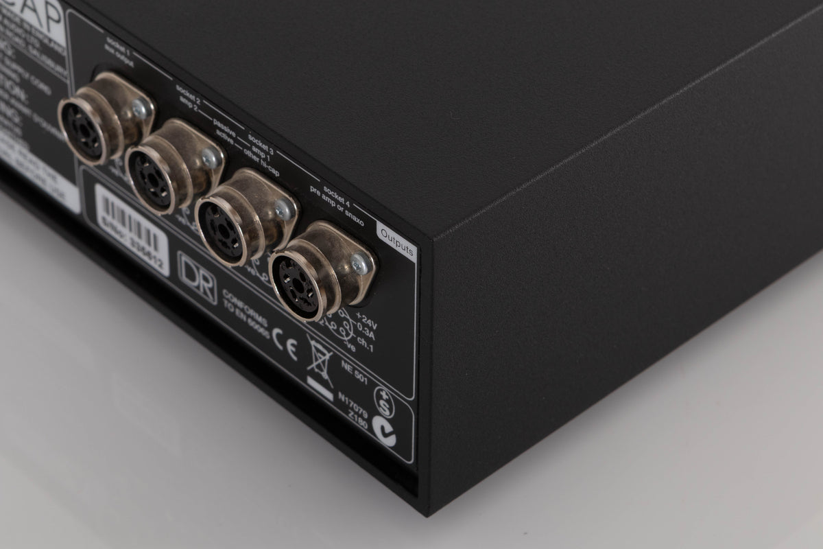 Rear left corner of a used Naim Hicap DR Power Supply in a Black finish