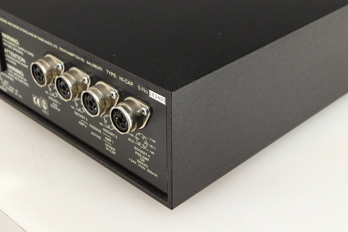 Rear left corner of a used Naim Hicap Power Supply in a black finish