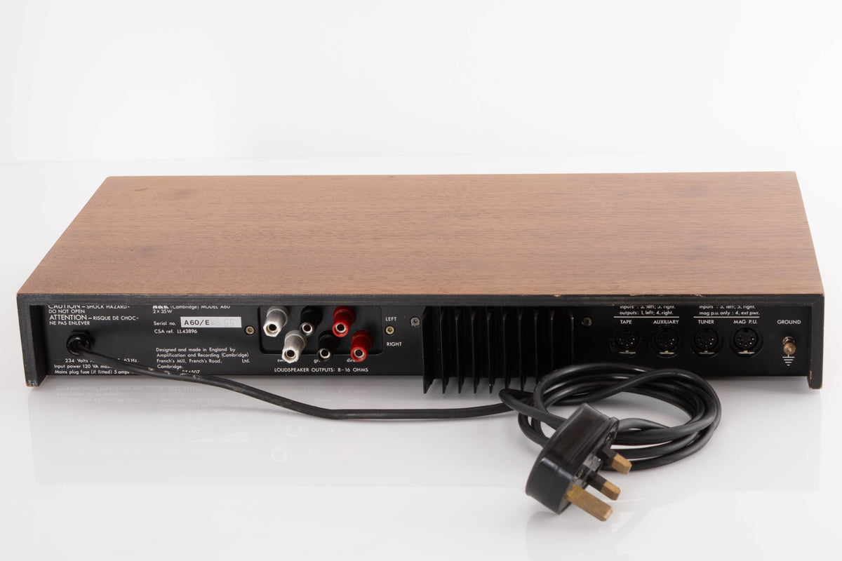 Rear view of a used A&R A60 Integrated Amplifier in a Teak finish showing Speaker Outputs and XLR Inputs