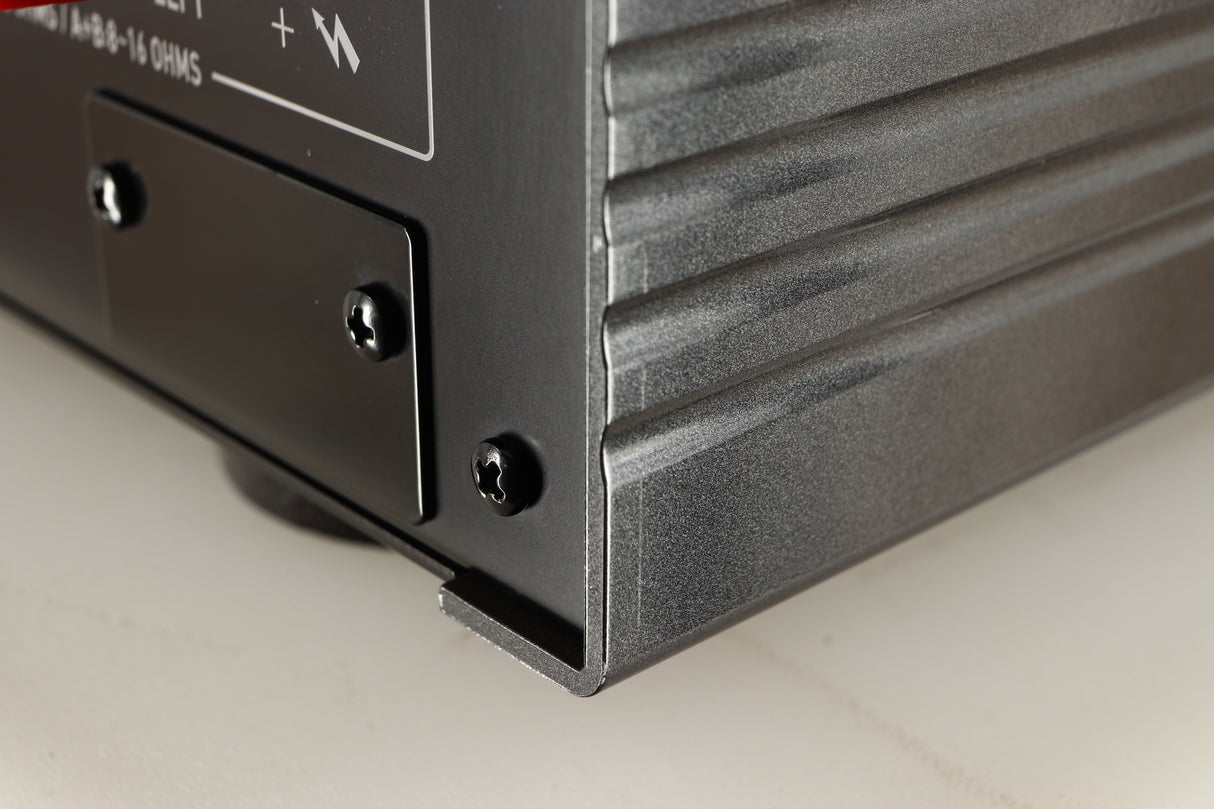 Close up of a used Accuphase E270 Integrated Amplifier showing scratch on left side