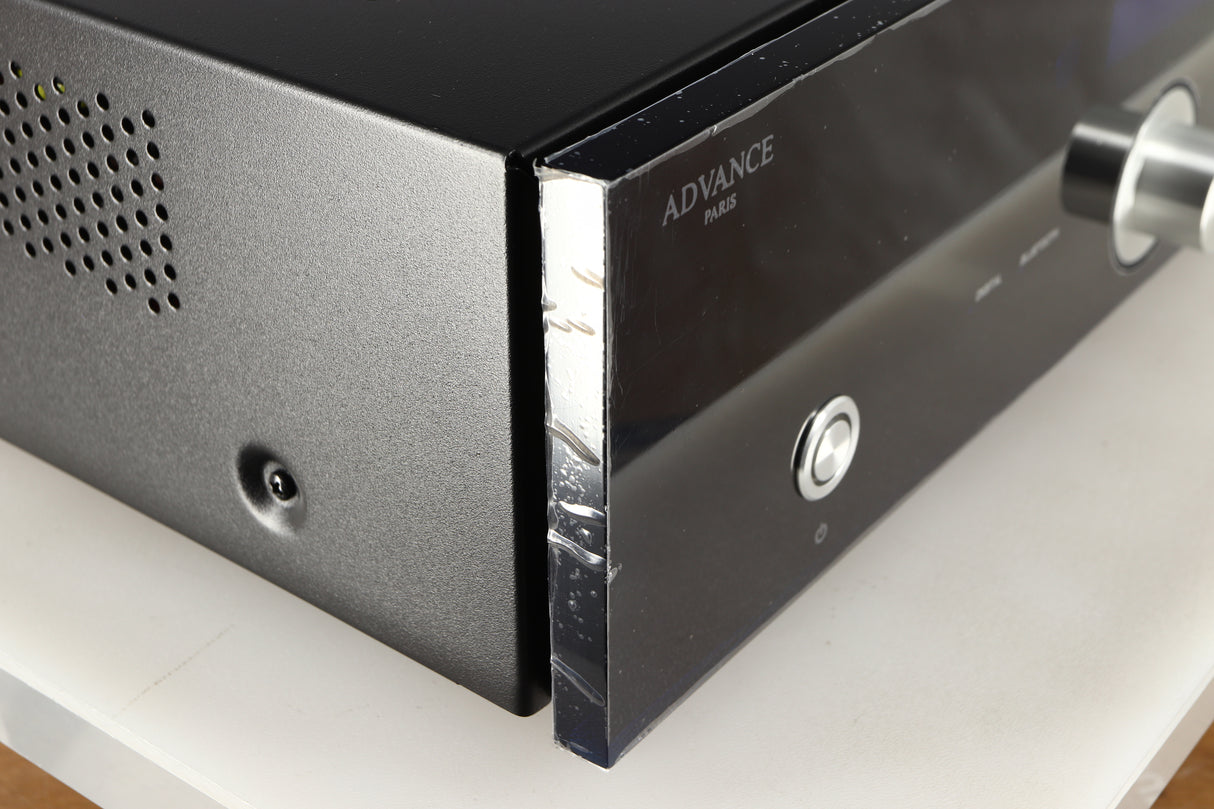 Front left corner of a used Advanced Paris X-i75 Integrated Amplifier in a black finish