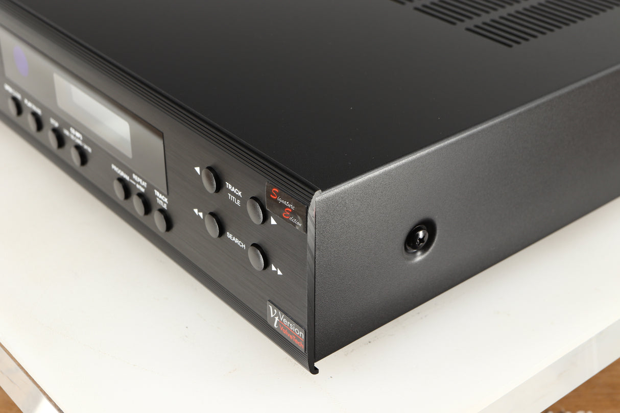 Front right corner of a used AMC XCDise-vt CD Player With MD5404us2 Tube Output in a black finish