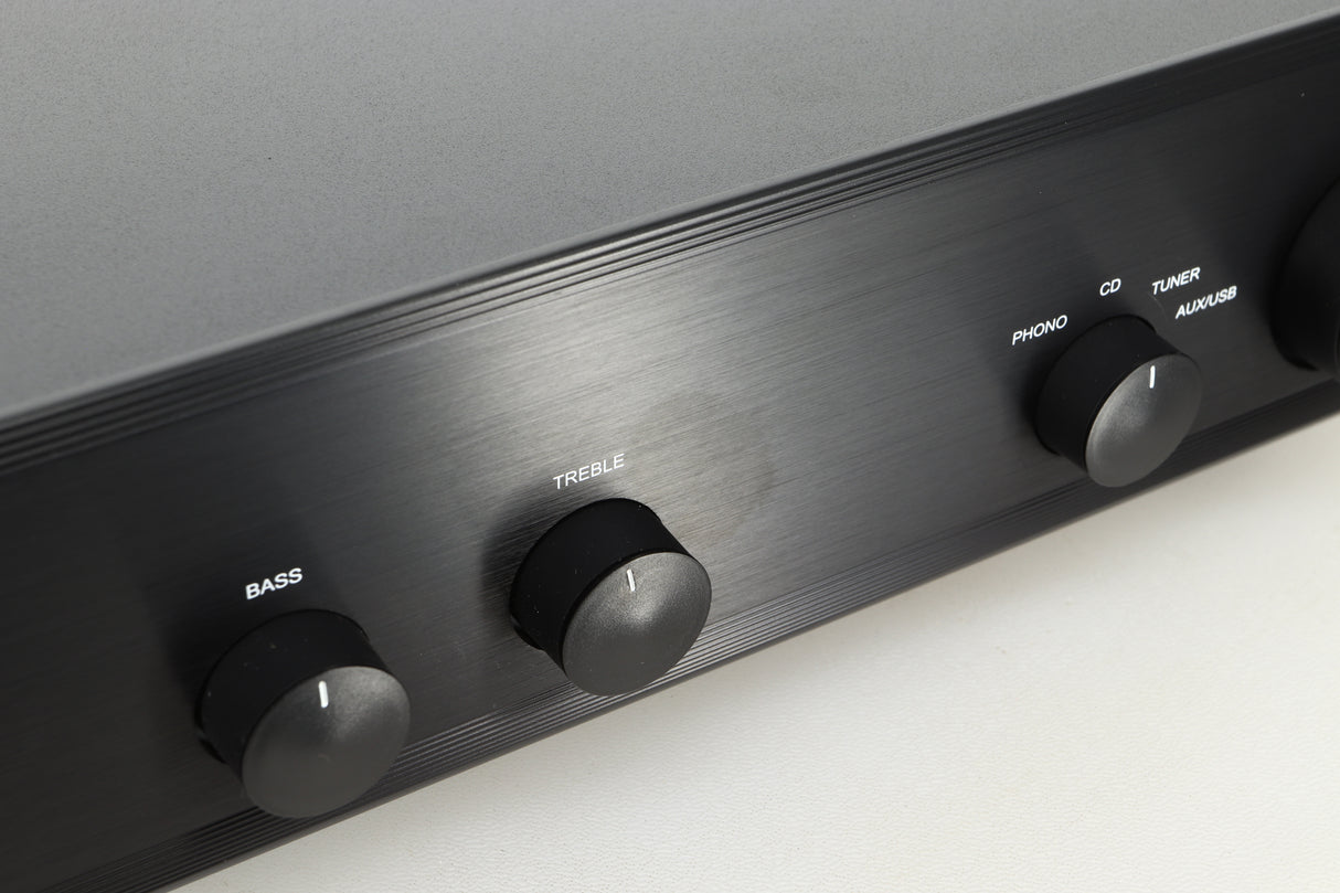 Close up view of an Ex Demo AMC XIA50 Integrated Amplifier fascia showing some discolouration near the treble knob