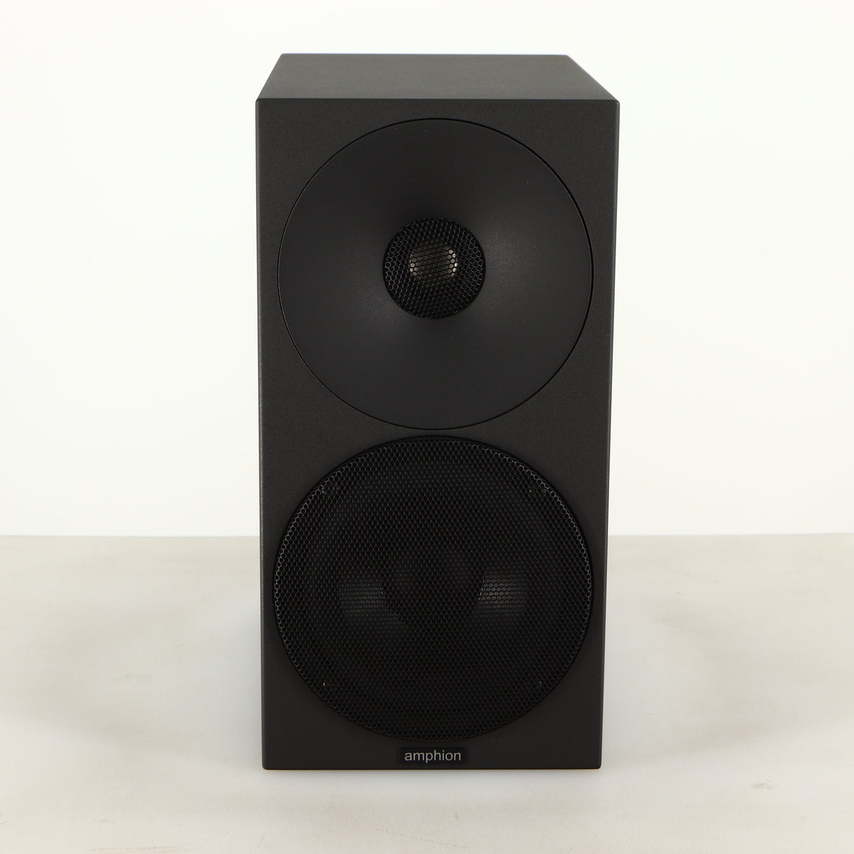 Front view of a used Amphion Helium 410 Standmount Speaker in a black finish