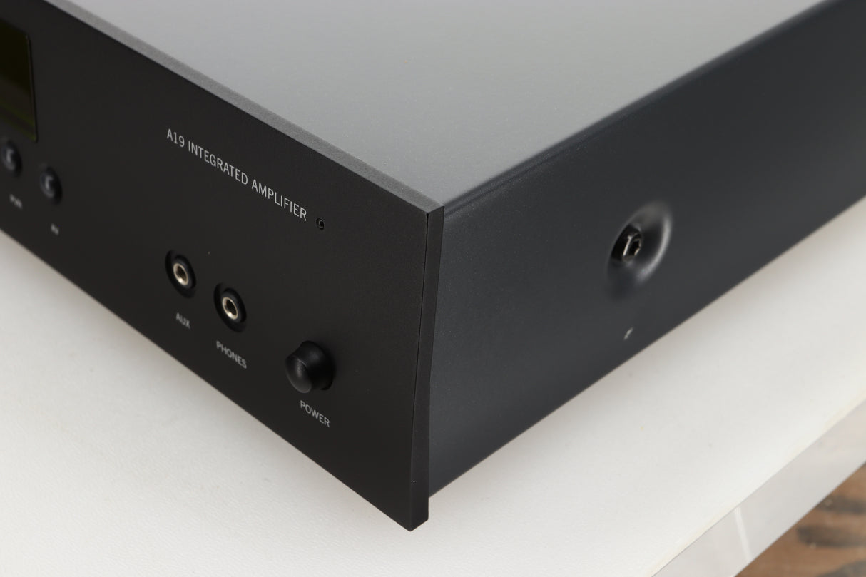 Front right corner view of a used Arcam A19 Integrated Amplifier in Black finish
