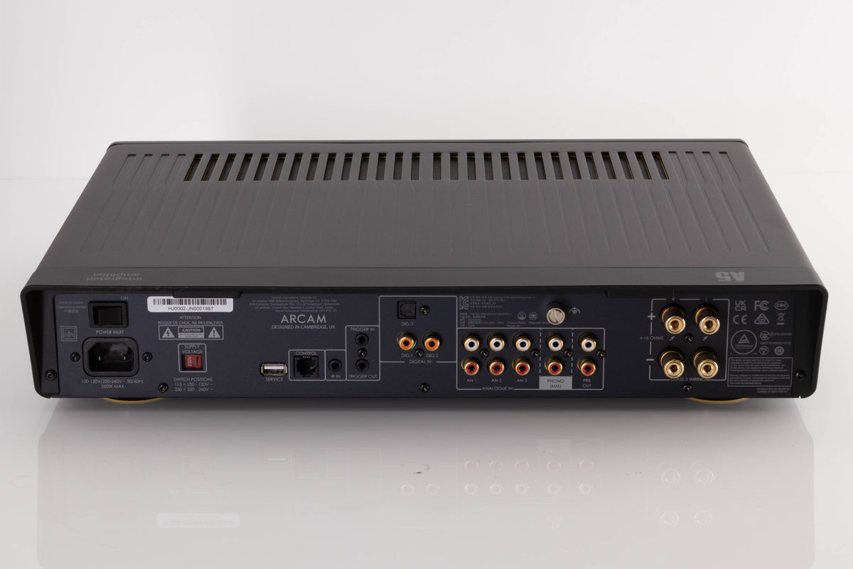 Rear view of a used Arcam A5 Integrated Amplifier in a Black finish showing Mains Input, USB Input, Digital Inputs, Optical Input, Network Input, Analogue Inputs, Phono Inputs and Pre Outputs