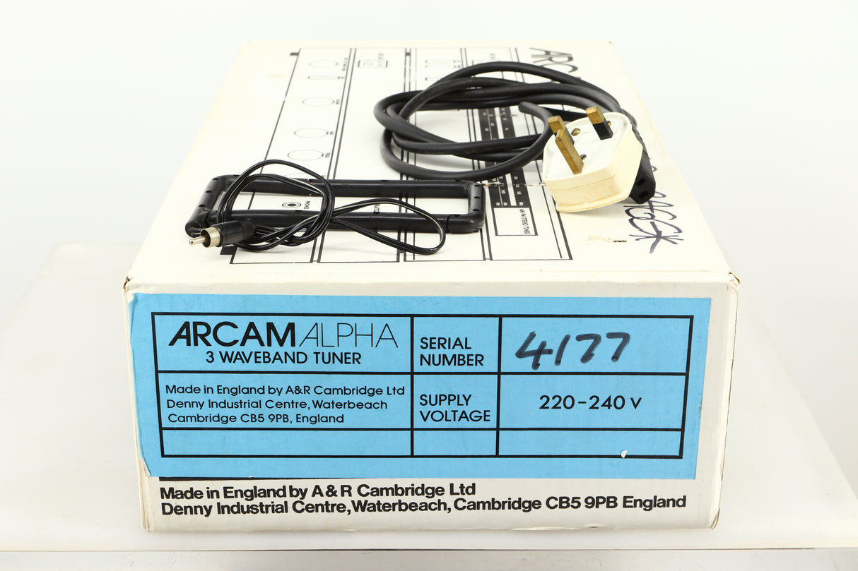 Box of a used Arcam Alpha II AM/FM Tuner showing mains cable, and aerial