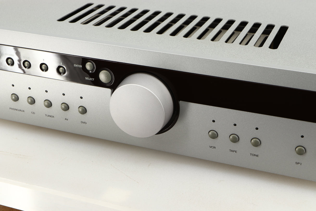 Close up of a used Arcam Diva A85 Integrated Amplifier in a silver finish showing some of the fascia