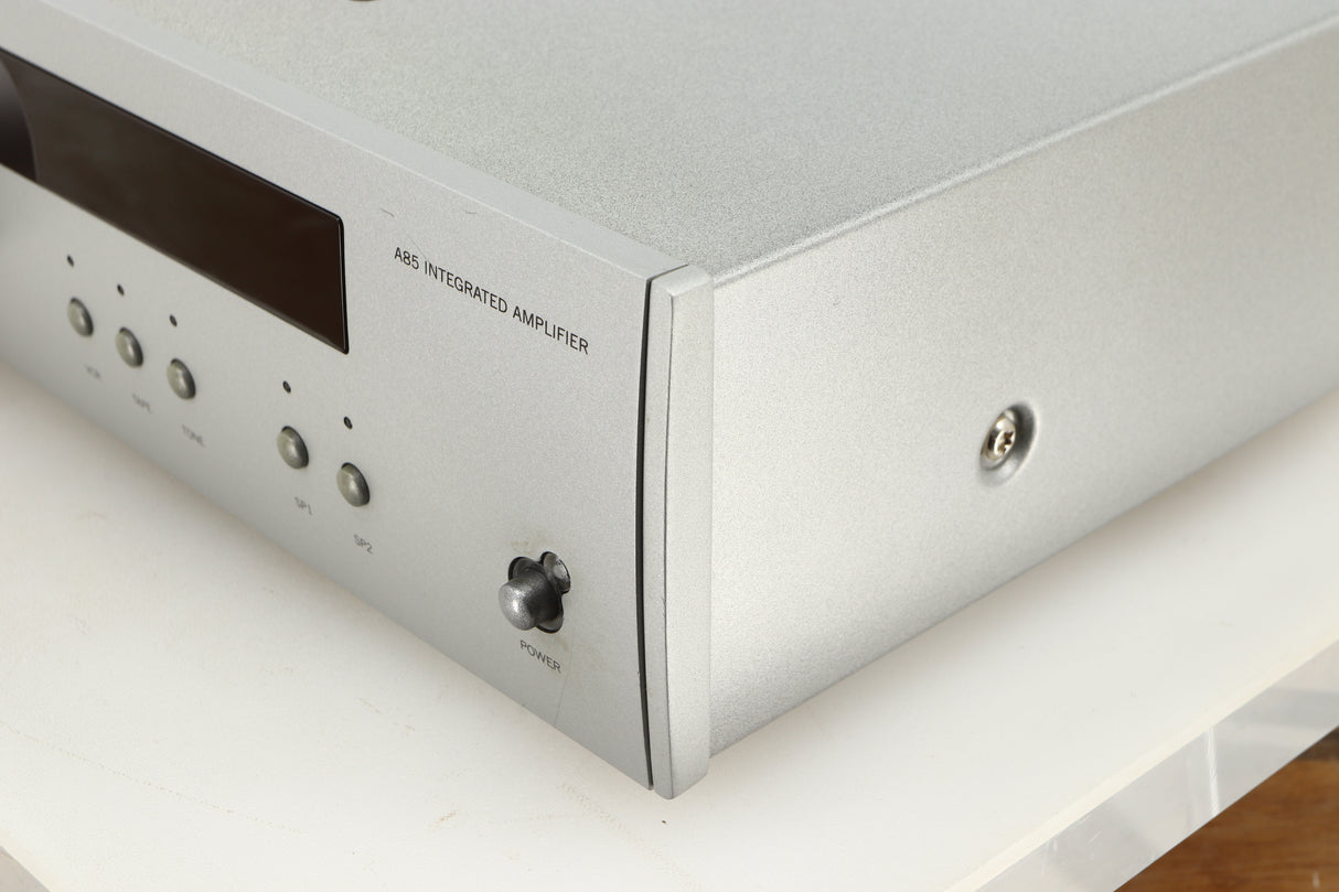 Front right corner of a used Arcam Diva A85 Integrated Amplifier in a silver finish