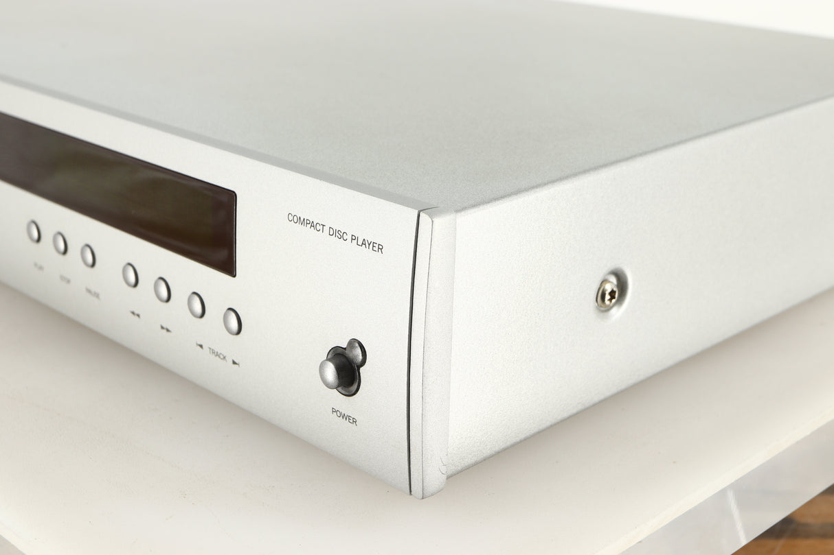 Front right corner of a used Arcam Diva CD72 CD Player in a silver finish