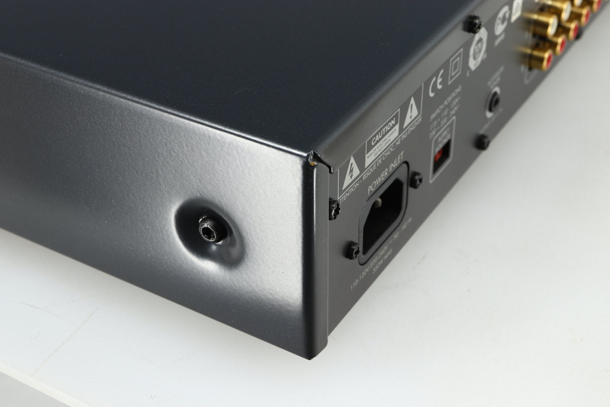 Rear right corner of a used Arcam FMJ A19 Integrated Amplifier in a black finish