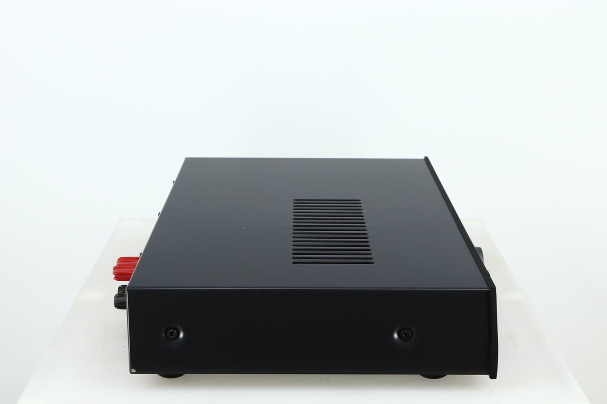 Left side view of a used Arcam FMJ A19 Integrated Amplifier in a black finish