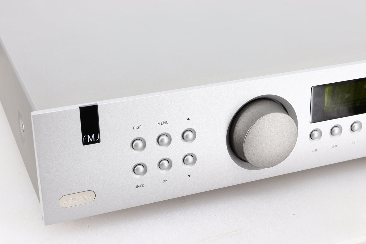 Close up of a used Arcam FMJ T32 FM / DAB Tuner in a silver finish showing some of the fascia