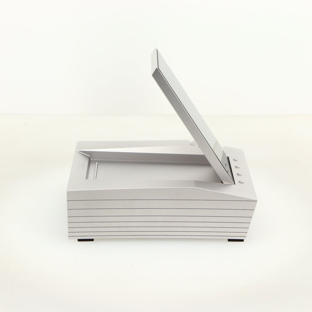 Left side view of a used Astrell & Kern Acro CA1000 Headphone Amplifier in a silver finish