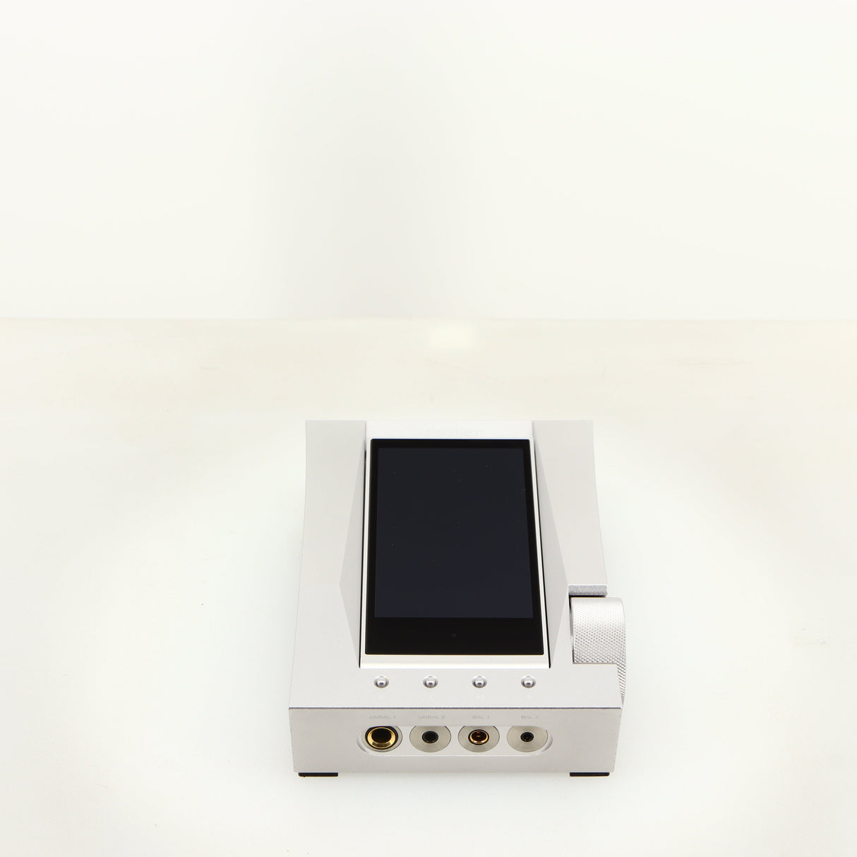 Top of a used Astrell & Kern Acro CA1000 Headphone Amplifier in a silver finish showing screen down
