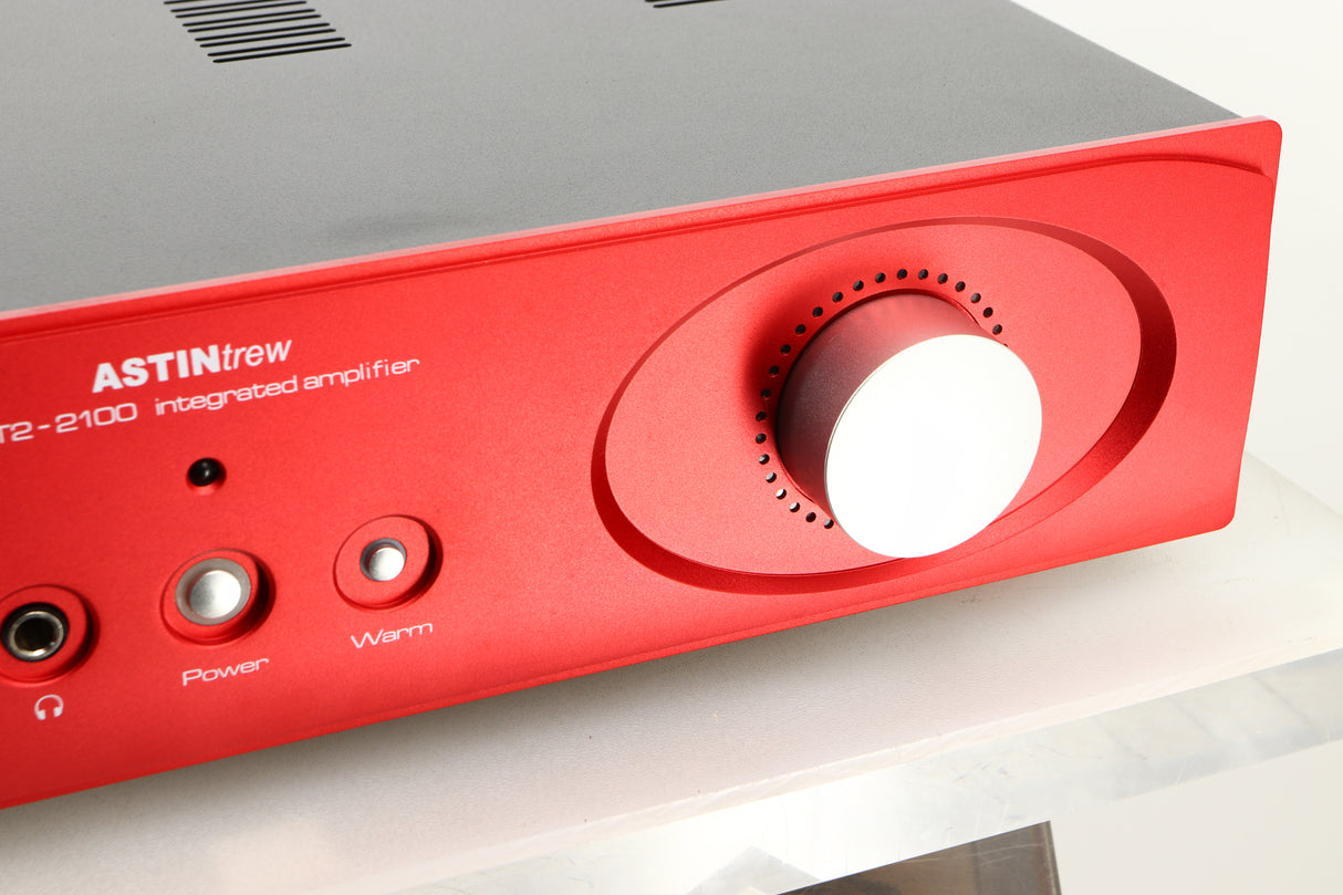Close up view of an Astin Trew AT2-2100 Integrated Amplifier in Red finish
