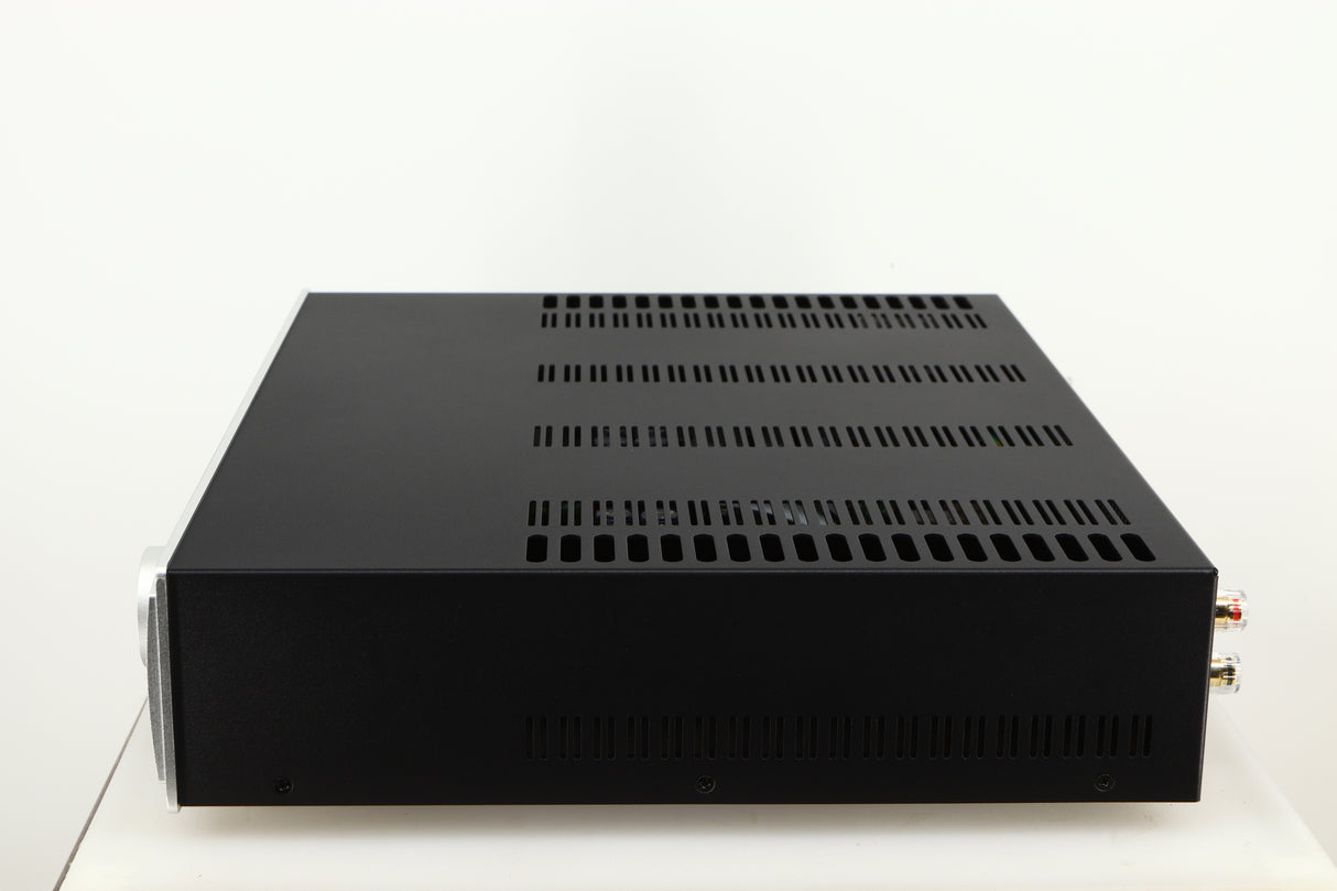 Right side view of a used Astin Trew AT2-2100 Integrated Amplifier in a silver finish