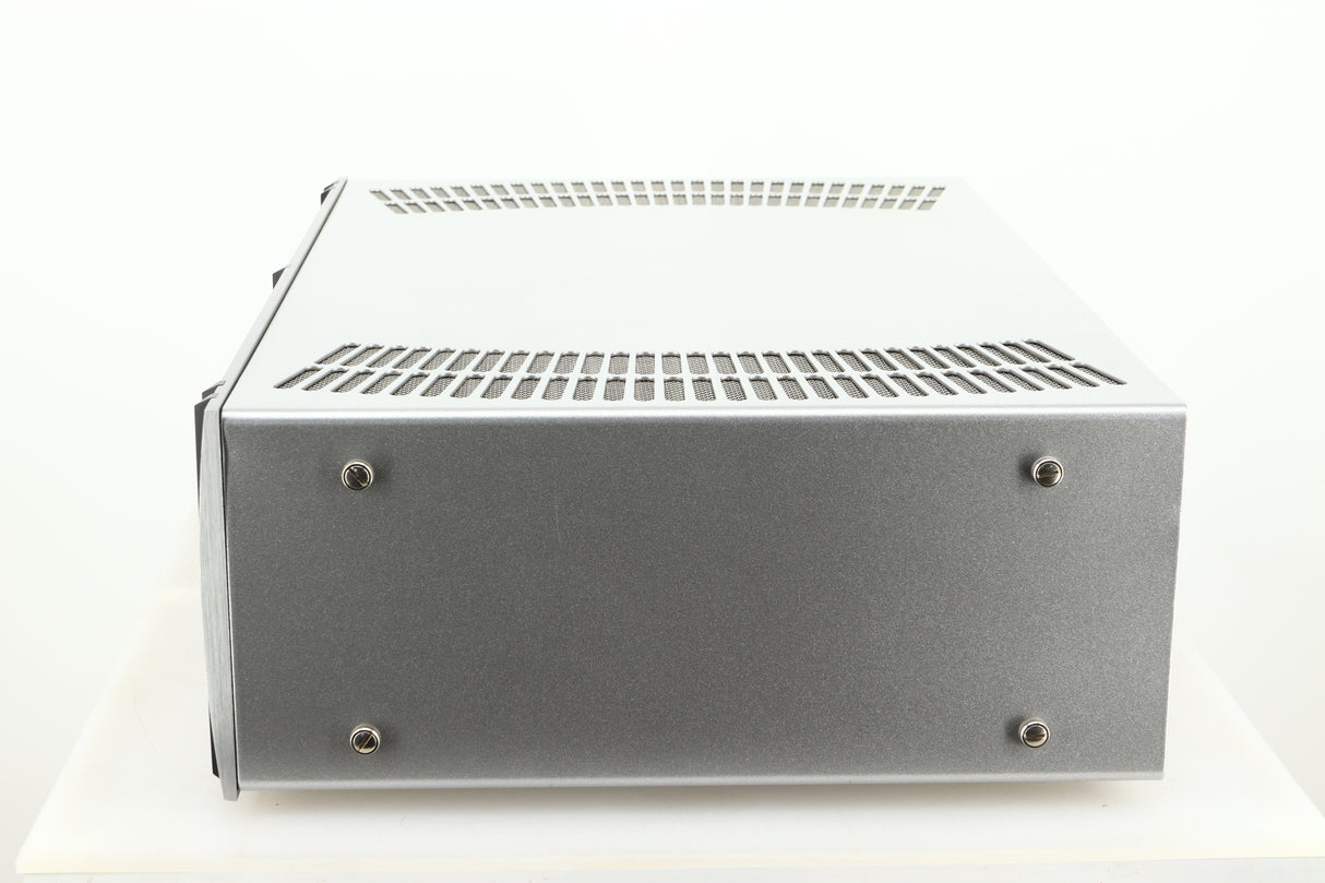 Side view of a used ATC P1 Power Amplifier in silver finish