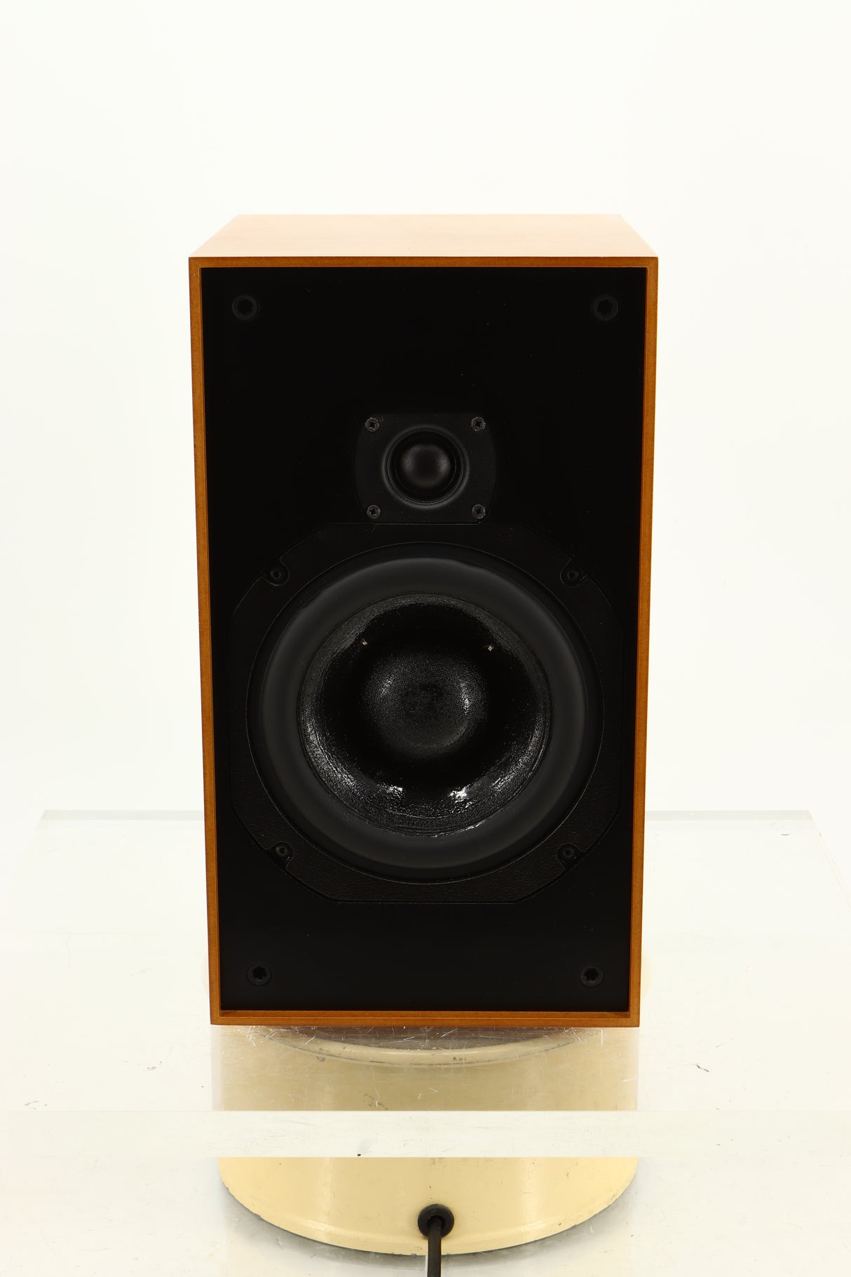 Front view of a used ATC SCM12 Standmount Speaker in Cherry finish