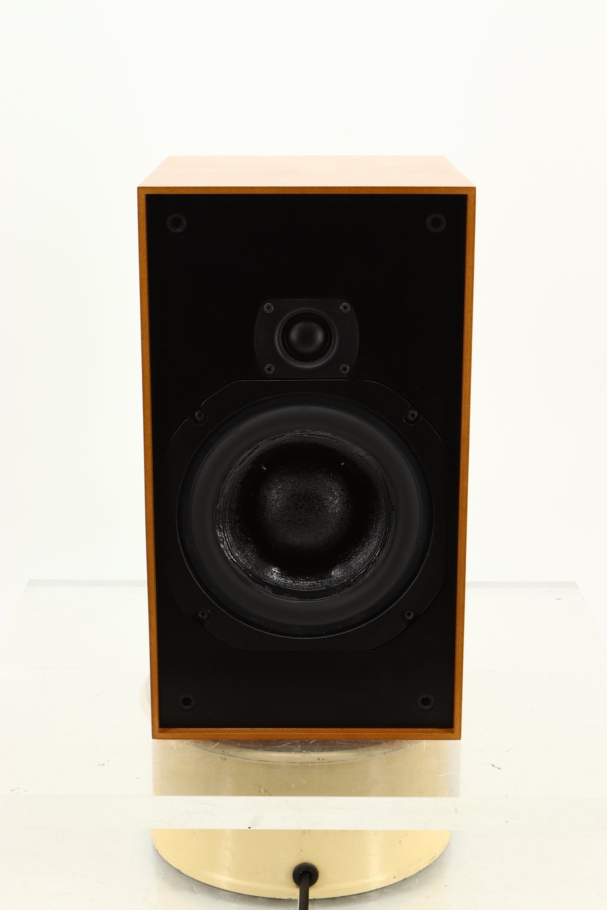 Front view of a used ATC SCM12 Standmount Speaker in Cherry finish