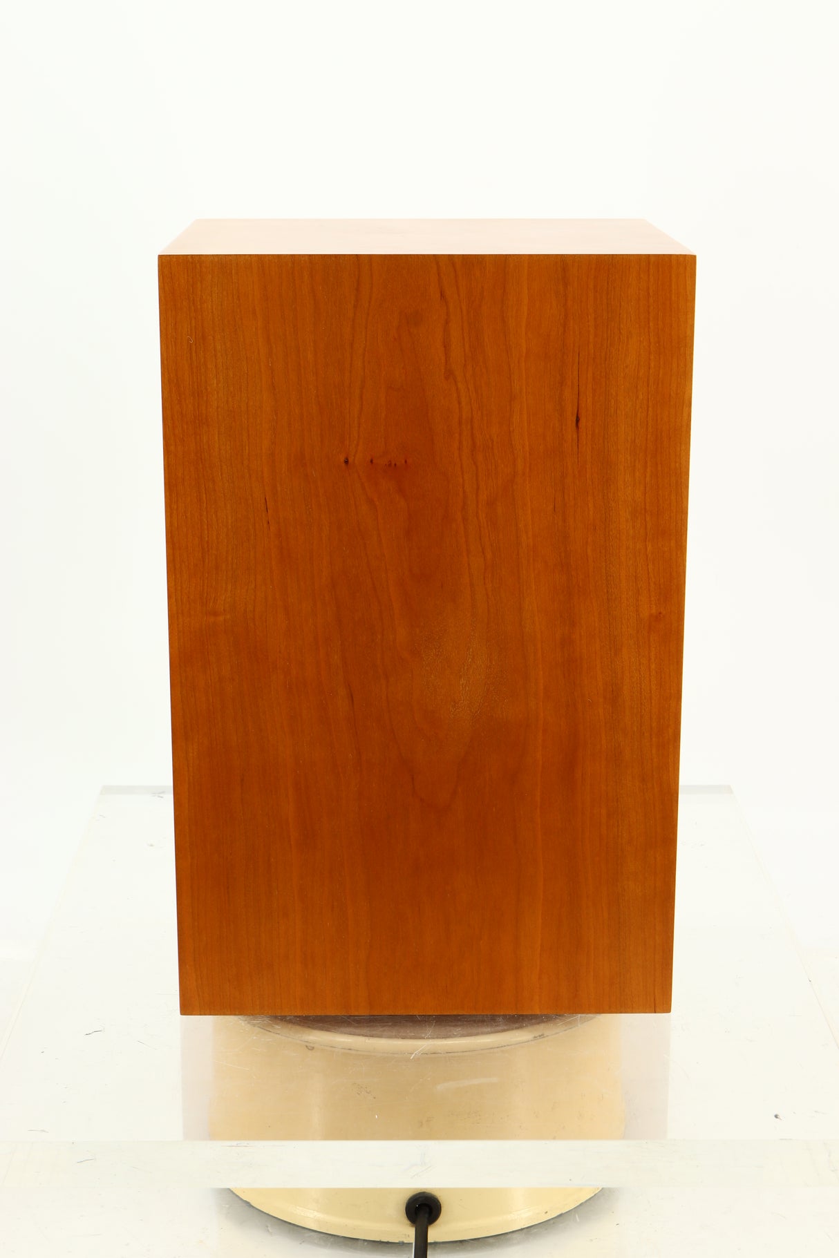 Side view of a used ATC SCM12 Standmount Speaker in Cherry finish