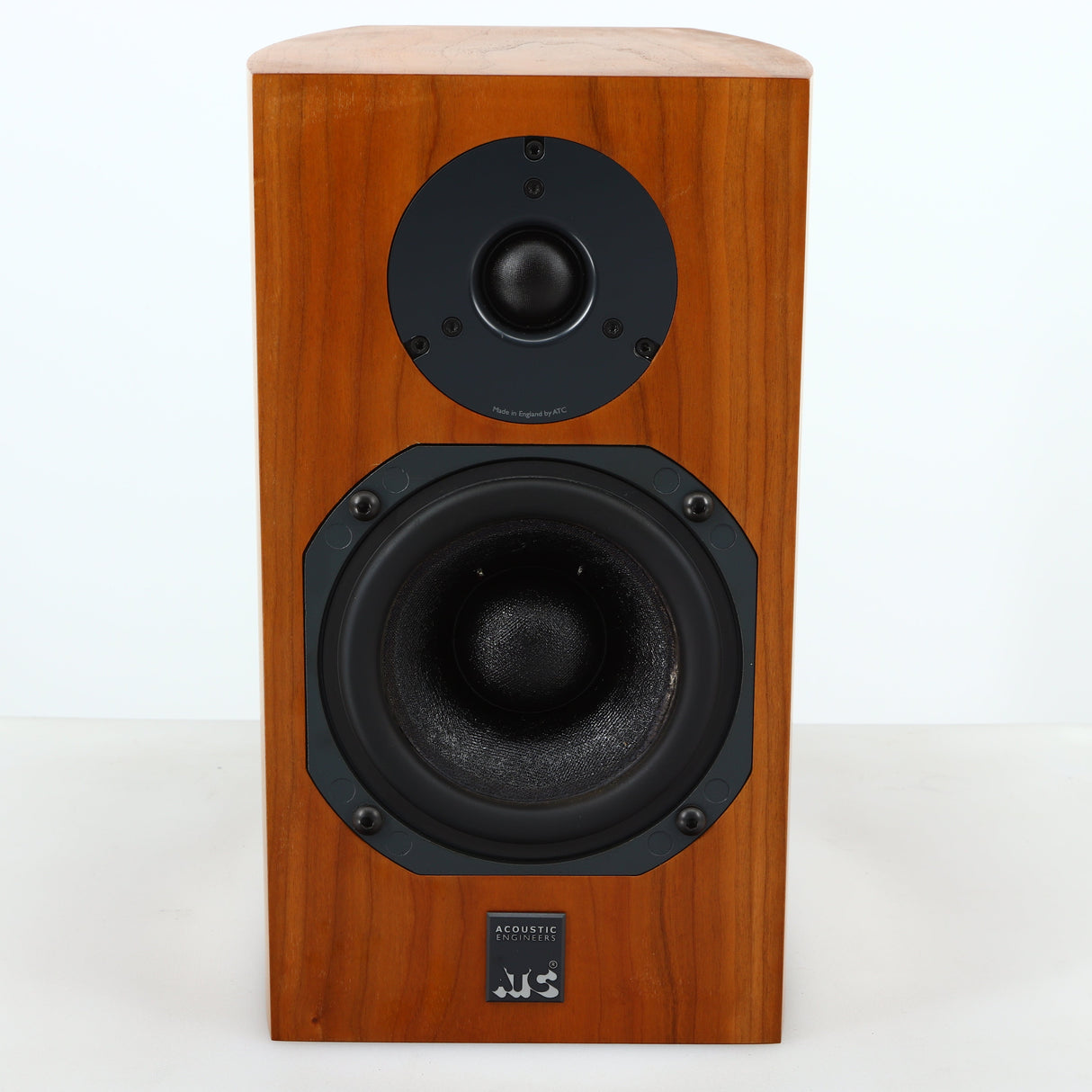 Front view of a used ATC SCM7 Standmount Speaker in a cherry finish