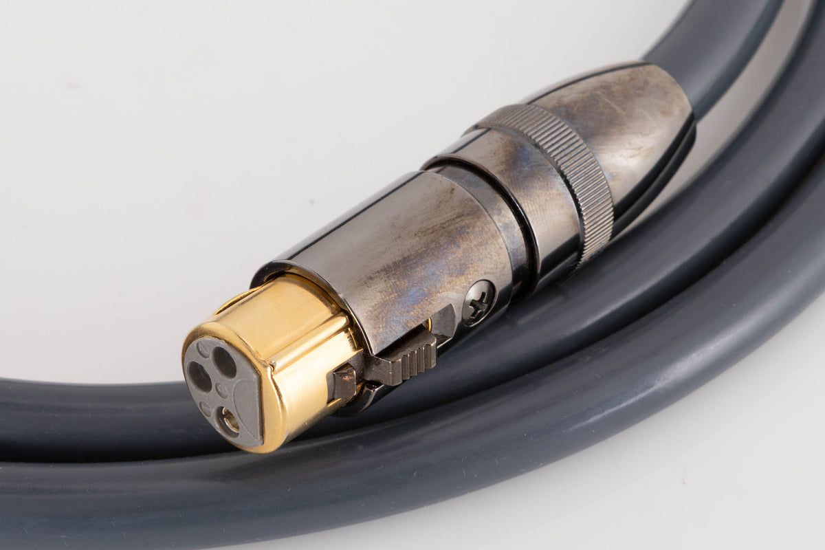 Close up of a used Atlas Ailsa XLR Interconnect Cable 1.5m showing connector