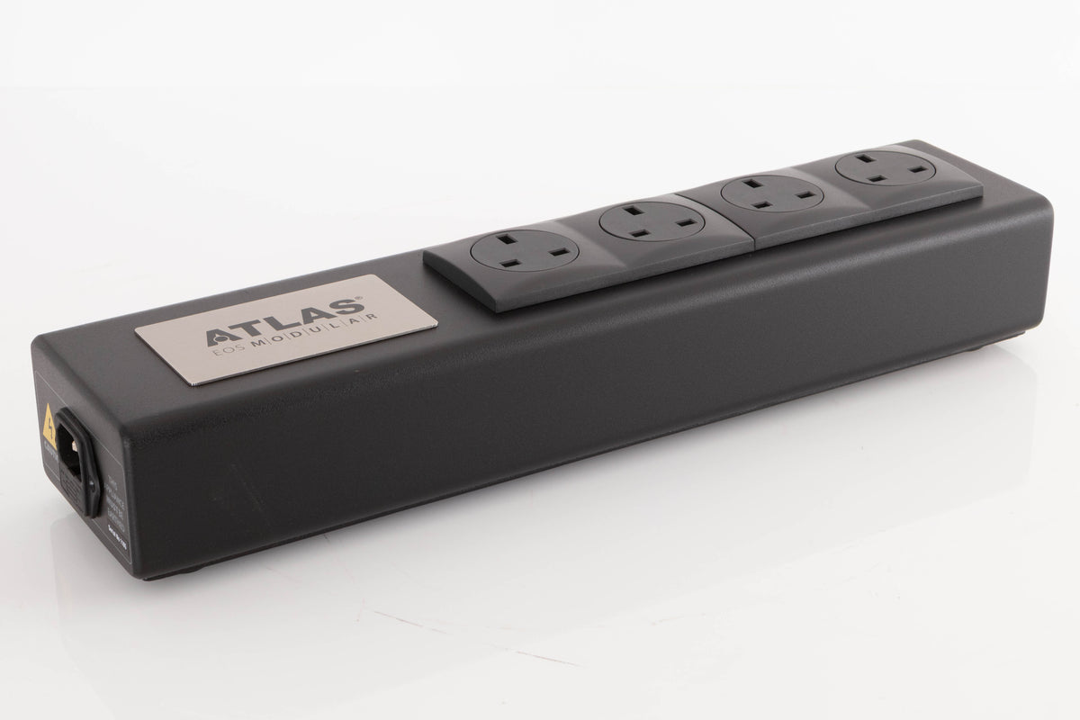 Front left corner of a used Atlas EOS Modular 4-Way Mains Block in a Black finish