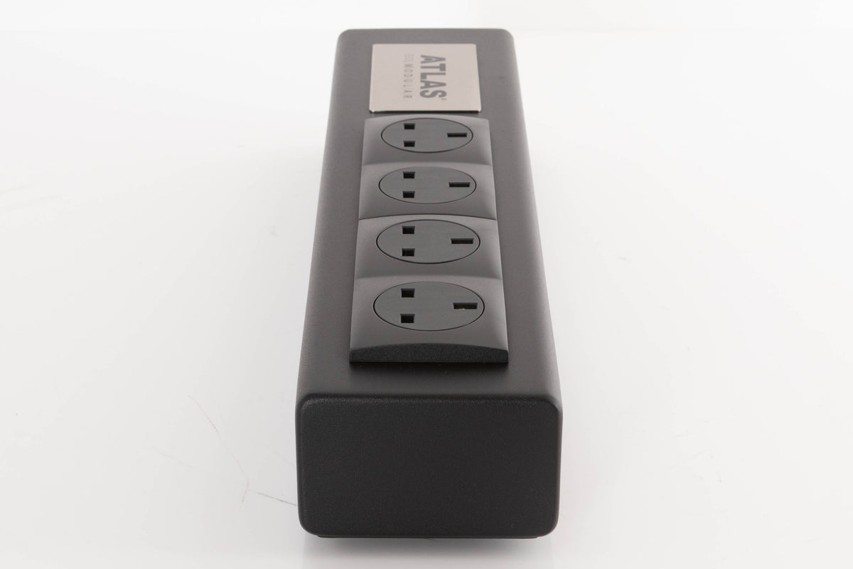 Right side view of a used Atlas EOS Modular 4-Way Mains Block in a Black finish