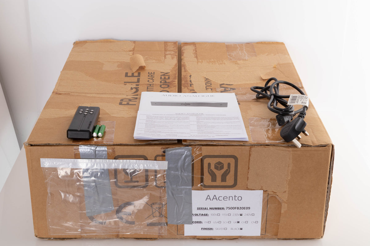 Box for a used Audio Analogue AACento Integrated Amplifier in a Black finish showing Remote, Batteries, Manual and Mains Cable