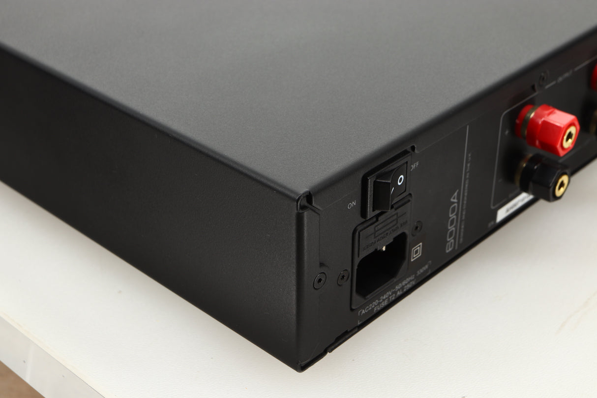 Rear left corner view of a used Audiolab 6000A Integrated Amplifier in Black finish