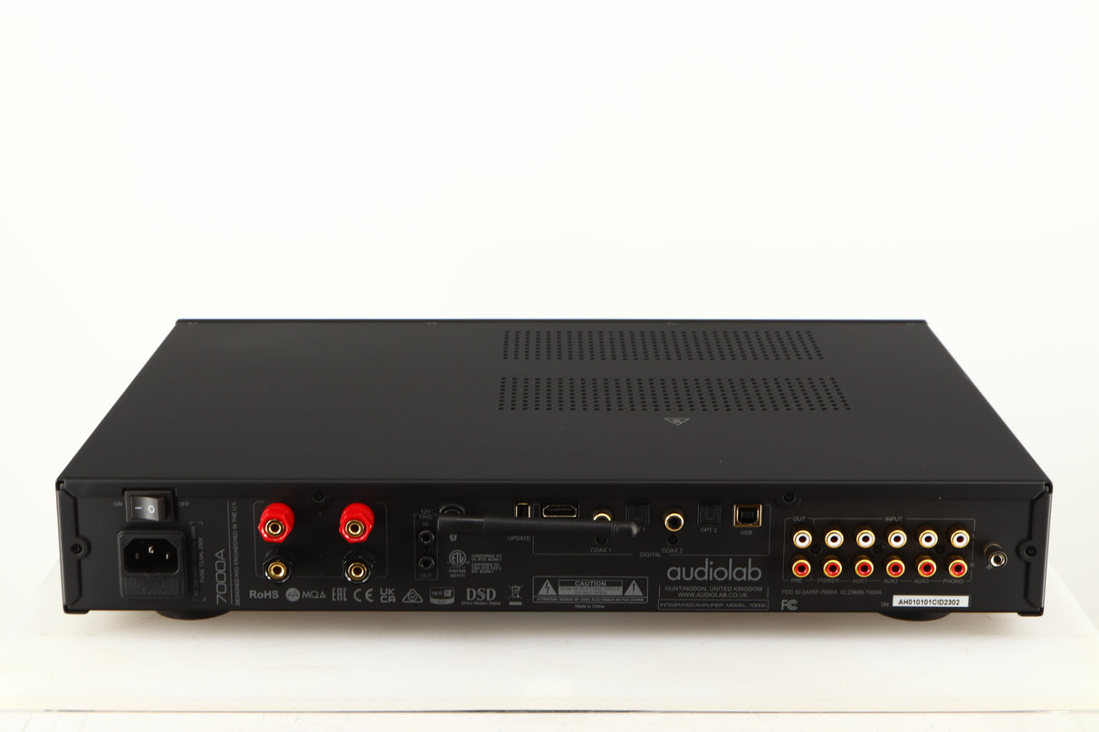 Rear view of a used Audiolab 7000A Integrated Amplifier in a black finish showing Mains Input, Phono Inputs, Phono Outputs, Optical Inputs, HDMI Input and USB Input