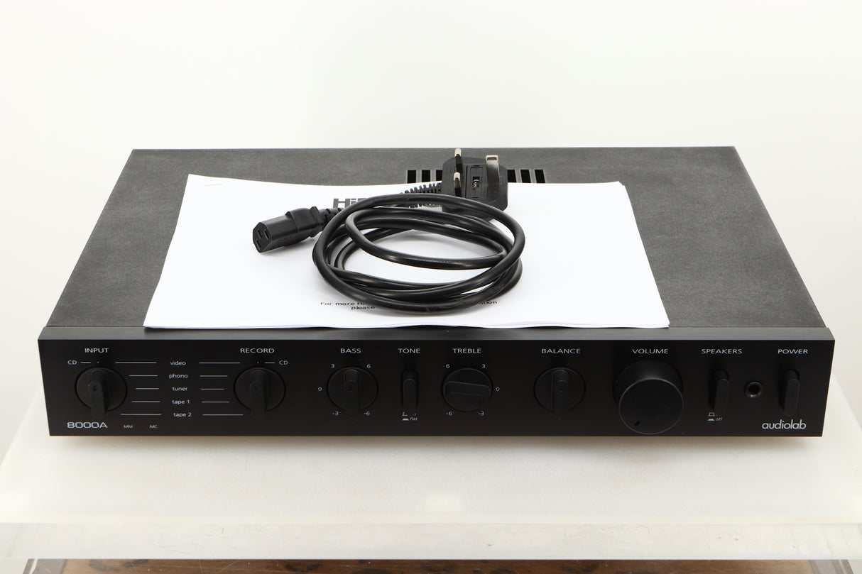 View of a used Audiolab 8000A Integrated Amplifier showing mains cable
