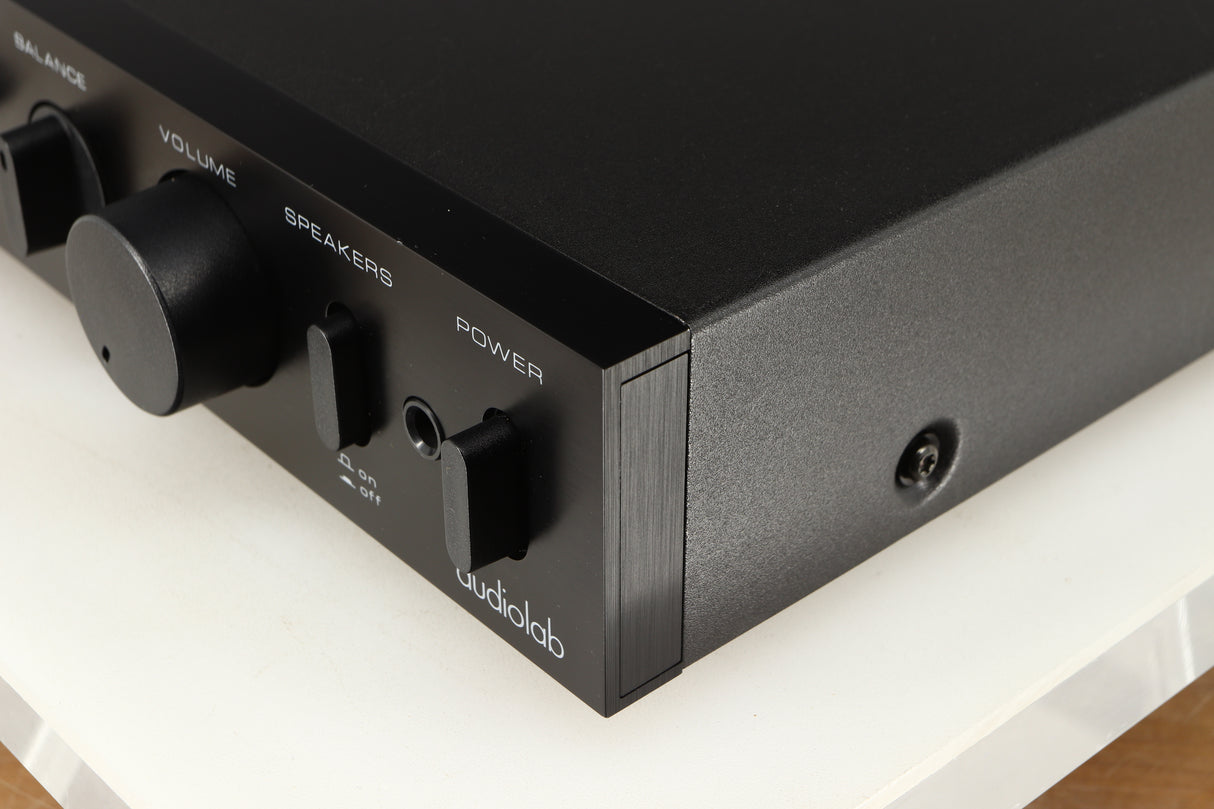 Front right corner of a used Audiolab 8000A Integrated Amplifier in a black finish