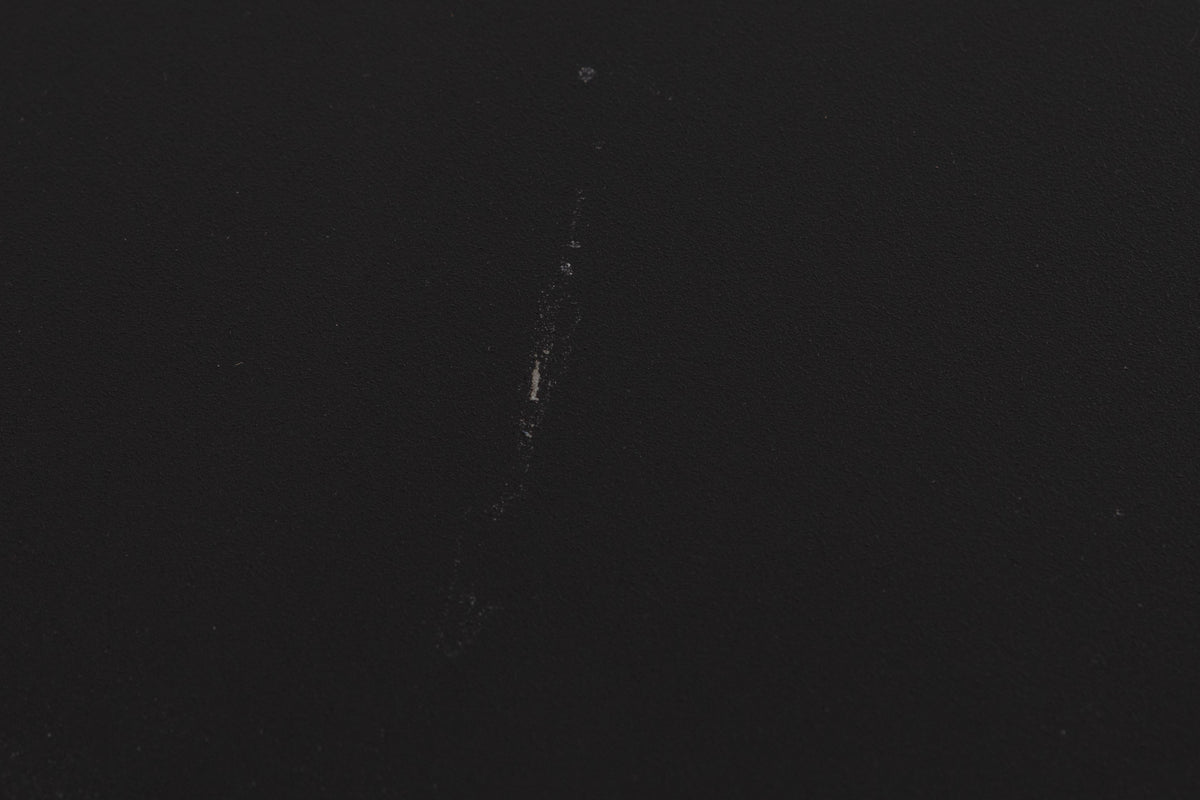 Close up of a used Audiolab 8000P Power Amplifier in a Black finish showing scratch on top