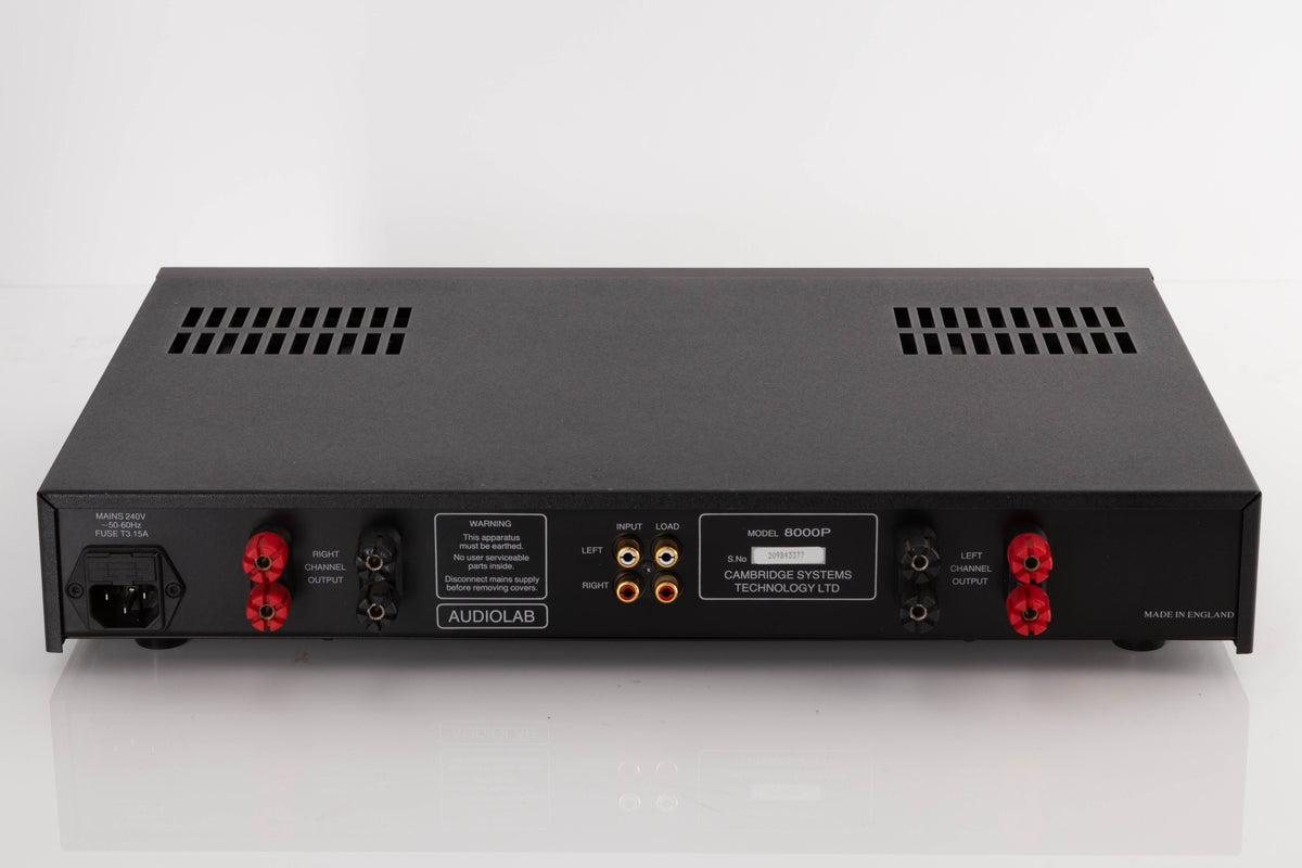 Rear view of a used Audiolab 8000P Power Amplifier in a Black finish showing Mains Input, Phono Inputs and Speaker Outputs