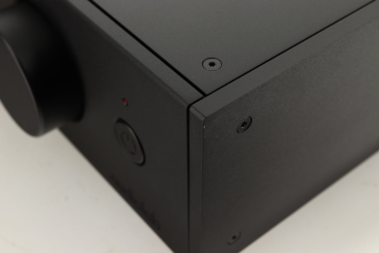 Close up view of a used Audiolab 9000A Integrated Amplifier in Black finish