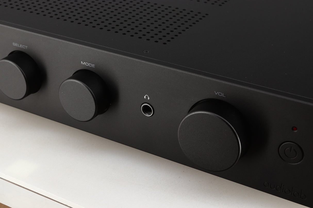 Close up of a used Audiolab 9000A Integrated Amplifier in a black finish showing some of the fascia