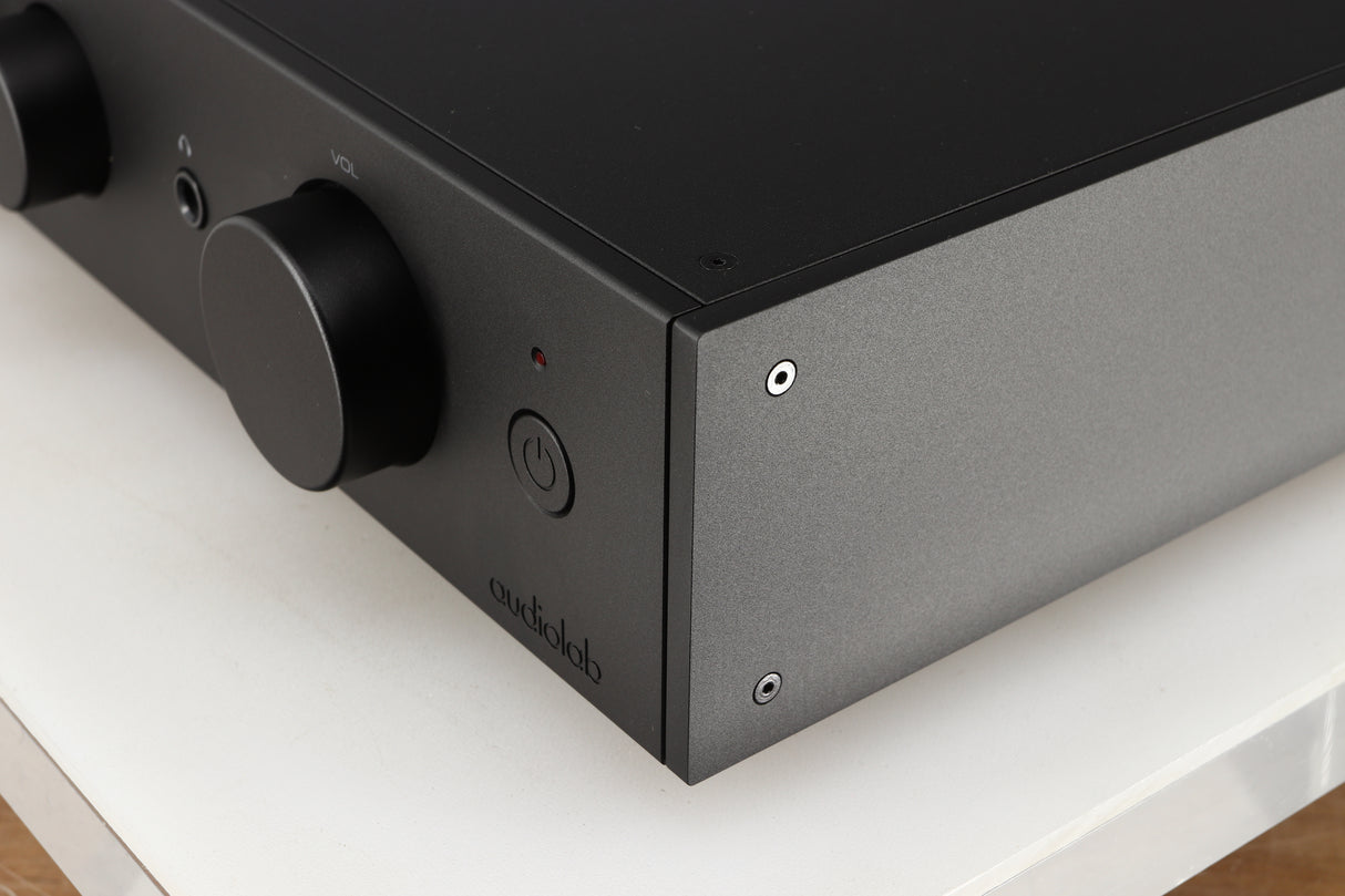 Front right corner of a used Audiolab 9000A Integrated Amplifier in a black finish