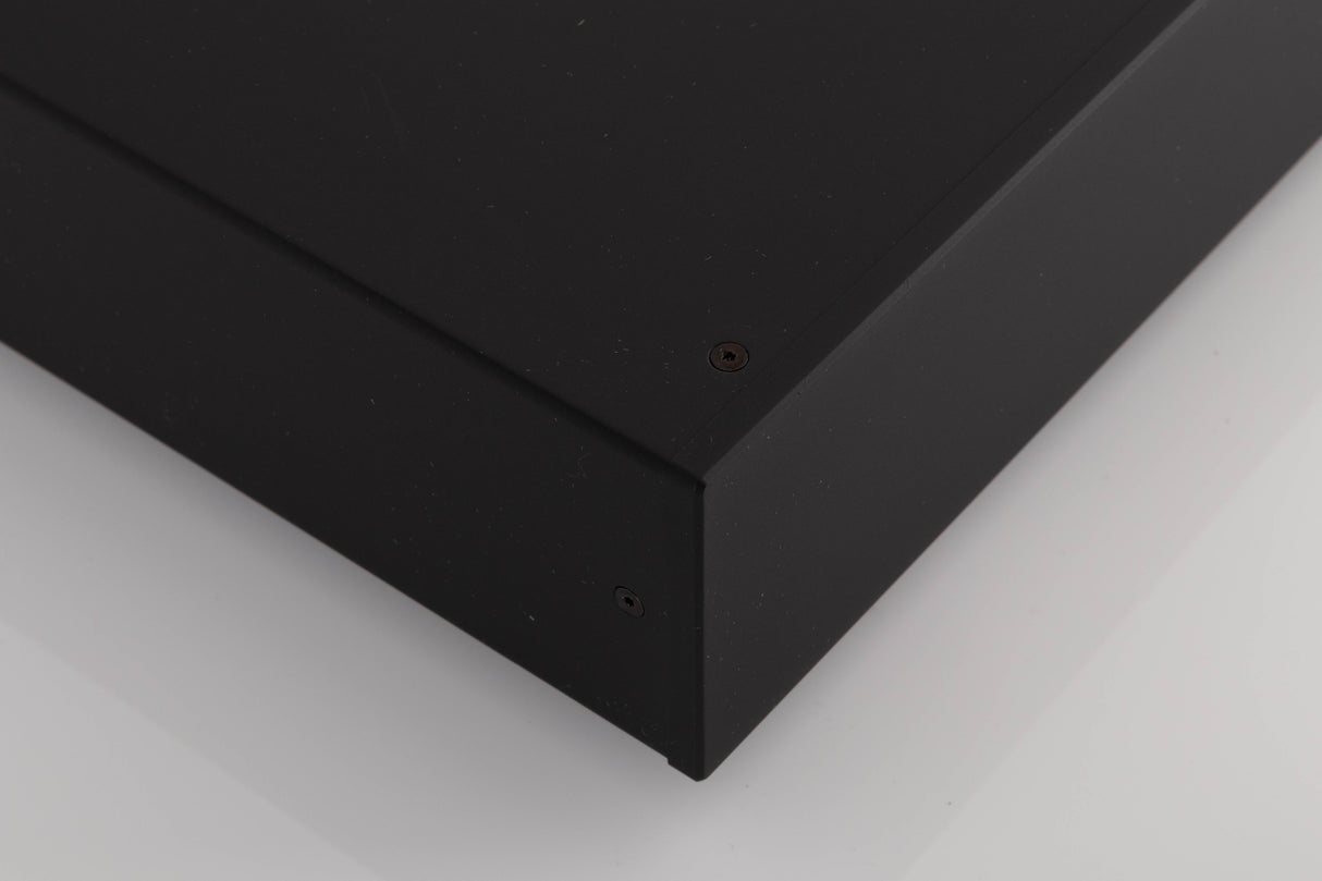 Front left corner of a used Audiolab DC Block 6 in a Black finish