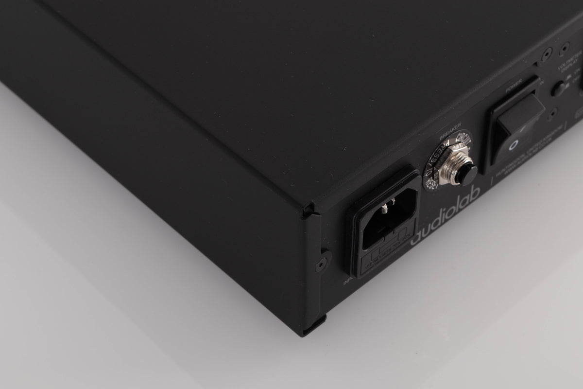 Rear right corner of a used Audiolab DC Block 6 in a Black finish