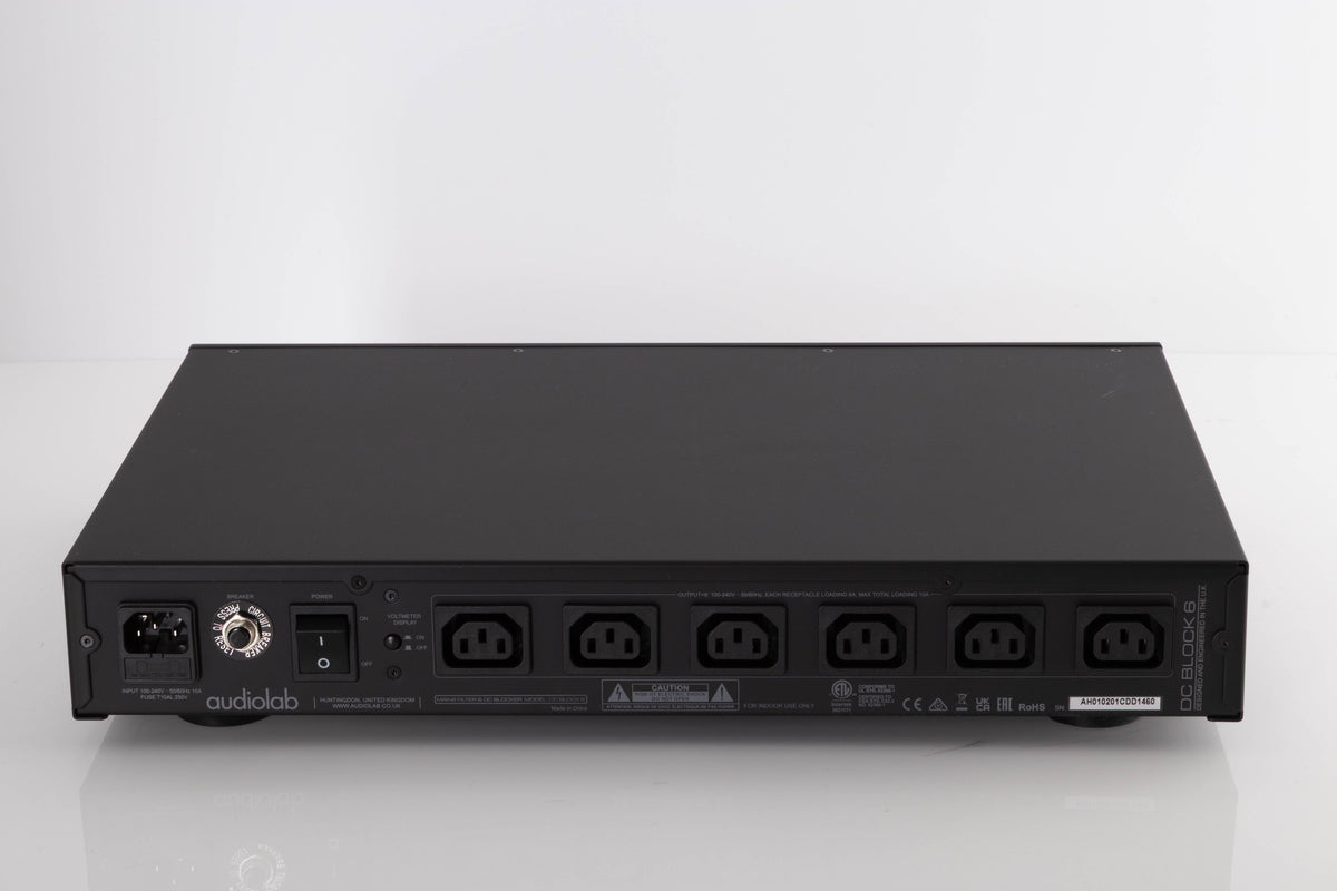 Rear view of a used Audiolab DC Block 6 in a Black finish showing Mains Input and Power Outputs