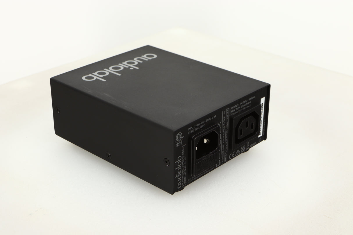 Rear left corner view of a used Audiolab DC Block Mains Filter in Black finish