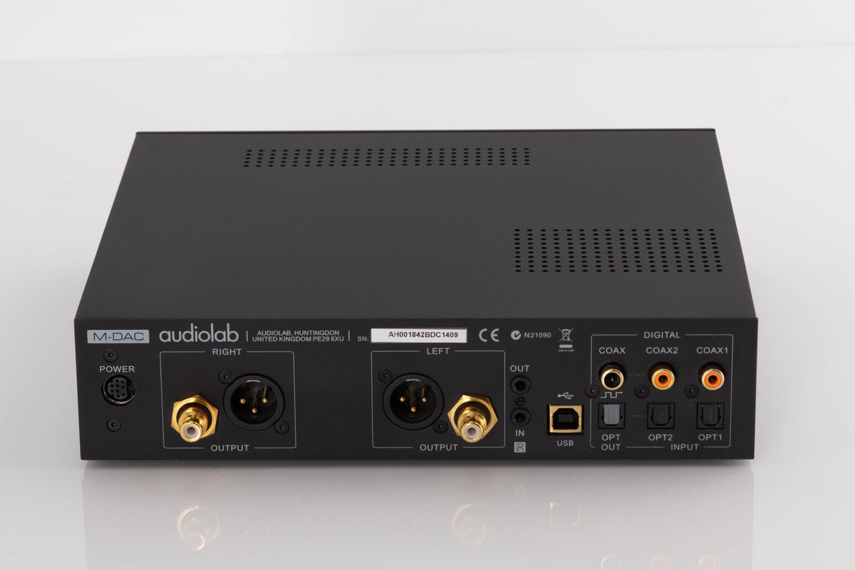Rear view of a used Audiolab M-DAC Digital Analogue Converter in a Black finish showing Power Input, Phono Inputs, XLR Outputs, Optical Inputs, Optical Output and COAX Input
