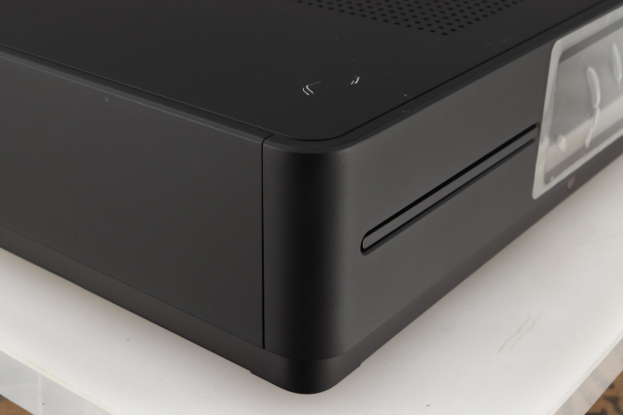 Front left corner of a used Audiolab Omnia Digital Integrated System in a black finish