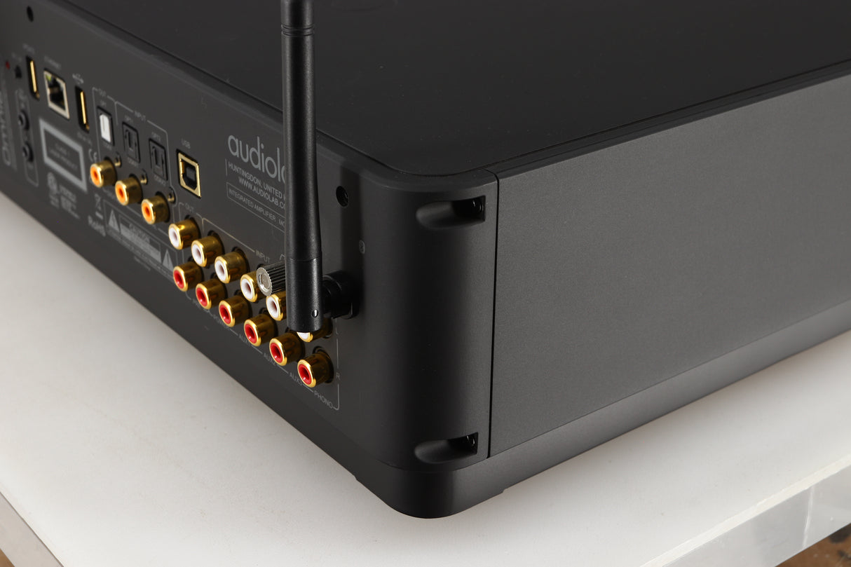 Rear left corner of a used Audiolab Omnia Digital Integrated System in a black finish