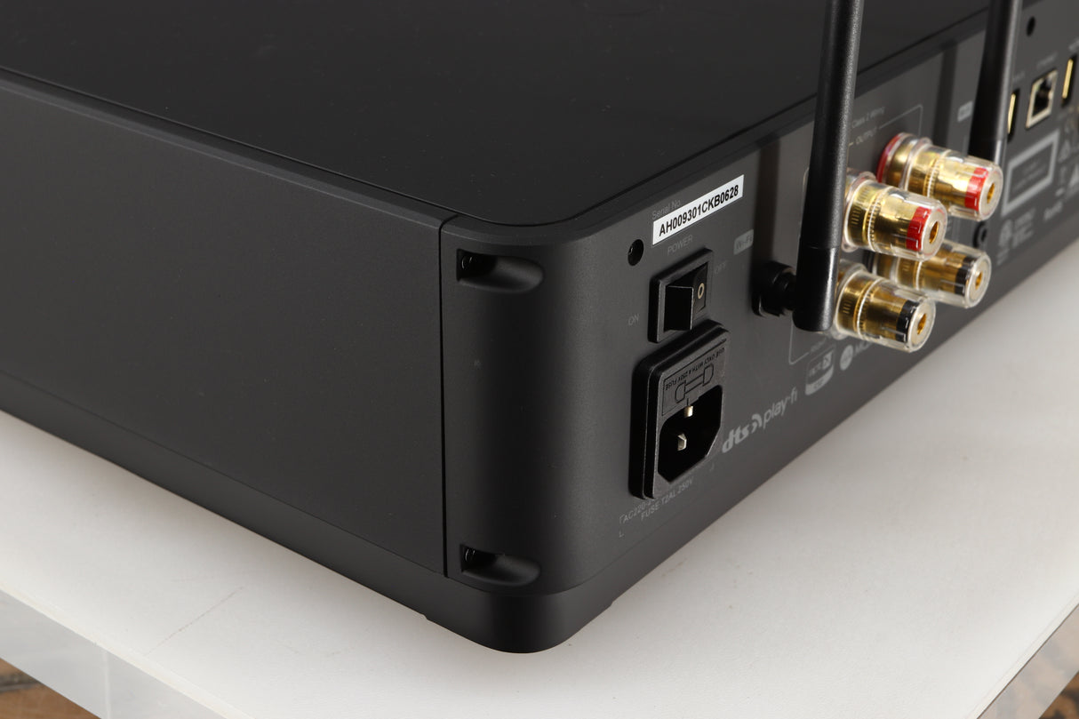 Rear right corner of a used Audiolab Omnia Digital Integrated System in a black finish