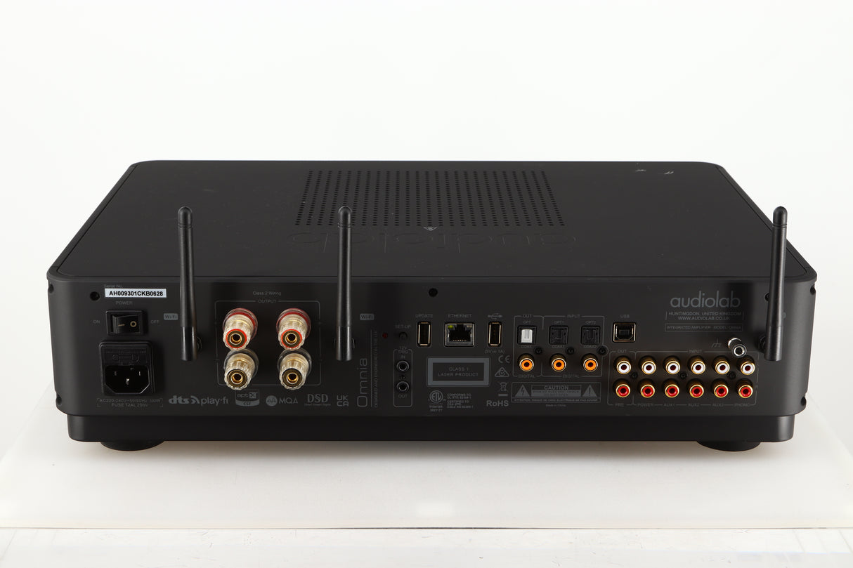 Rear view of a used Audiolab Omnia Digital Integrated System in a black finish showing Mains Input, Phono Inputs, Ethernet Input, Optical Inputs and Speakers Outputs