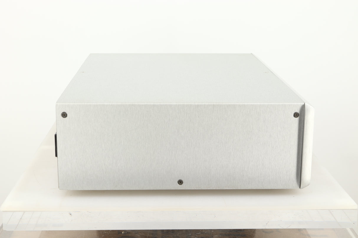 Side view of a used Ayre CX-7 CD Player in silver finish